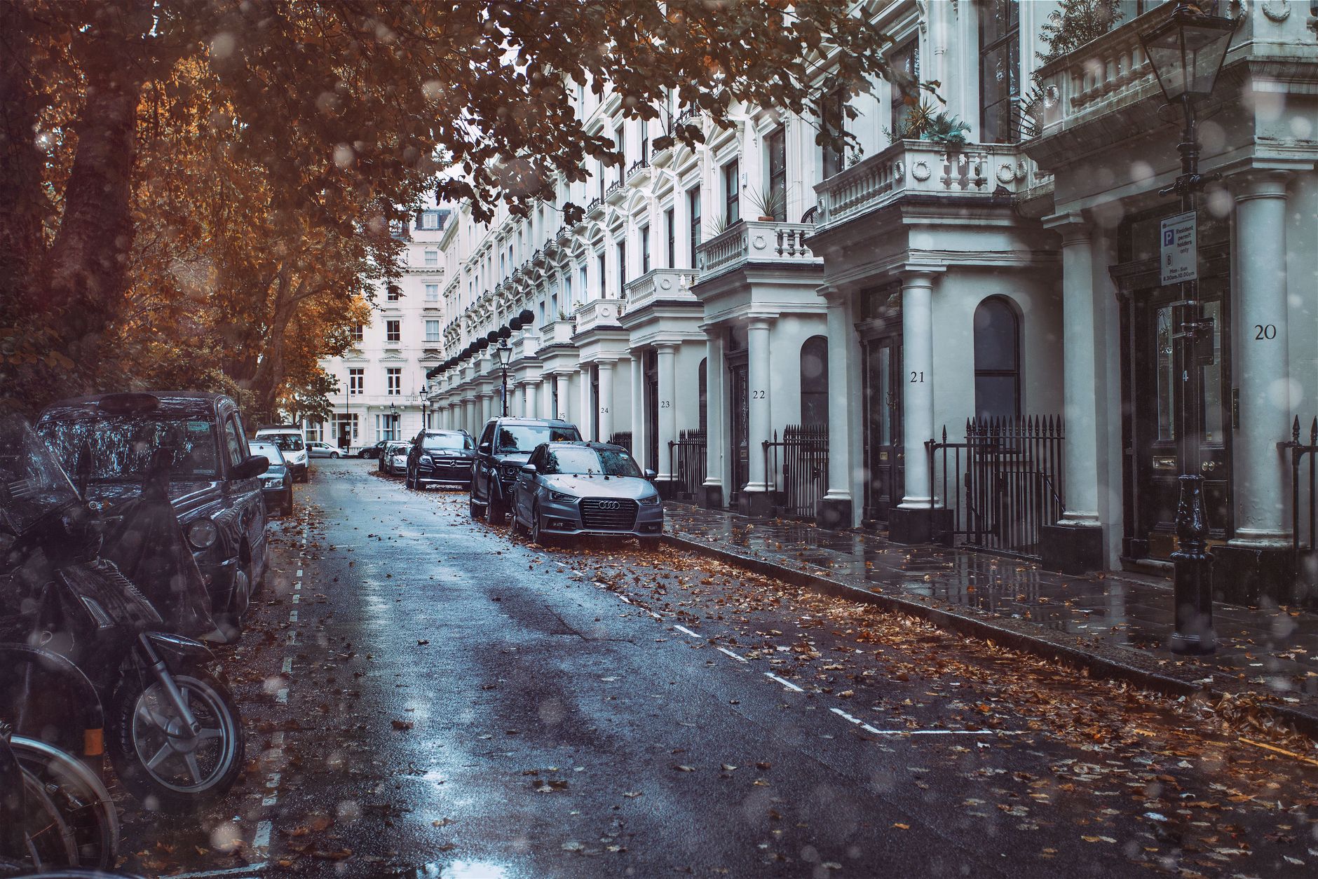 Cars parked along a wet Cork street, the everyday spot where a parallel park is really used
